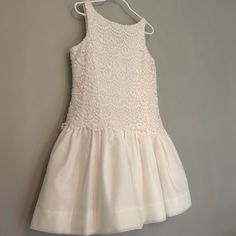 Stunning Floral Embroidery Dress. Effortless Fit-And- Flare-Dress. An Irresistibly Adorable Choice For Any Occasion. Elegant Sleeveless Lace Dress For Dress-up, Elegant First Communion Dress For Summer, Elegant Dresses With Pearl Embroidery For Formal Occasions, Sleeveless Floral Embroidered Baptism Dress, Spring Fitted Lace Dress For First Communion, Spring Sleeveless Dress With Pearl Embroidery, Fitted Lace Dress For First Communion In Spring, Elegant Summer Lace Dress For First Communion, Spring First Communion Fitted Lace Dress