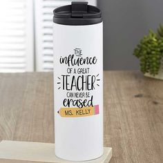 a white travel mug with the words, the influence of a great teacher can never be crossed