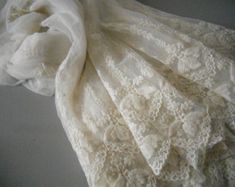 an image of a white dress with lace on it