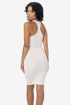 This sporty racerback dress is made of a heavy 2x1 rib with spandex so it has a flattering stretch. This textile features more compression than our regular cotton spandex styles and has been garment dyed and washed, so it is shrink-free, in 3 basic colors for your wardrobe. The mid-length of this dress makes it perfect for wearing day to night and is perfect for spring and summer. Made in Los Angeles, Calif. by sewers who are paid up to $20 an hour or more with benefits and overtime. • 2x1 Rib• 4 Months Pregnant, Women In White, La Outfits, Black And White Baby, Racerback Dress, Sweaters And Leggings, Basic Colors, Quality Clothing, Cotton Spandex