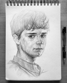 a pencil drawing of a young man's face