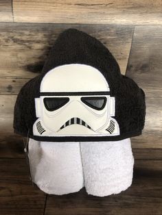 a star wars towel holder with a storm trooper face on it