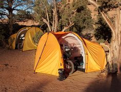 two tents set up next to each other in the desert