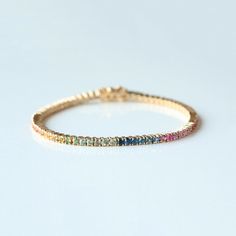 Attract To Your Loved Ones With This Beautiful Rainbow Sapphire Colorful Tennis Bracelet, Round Multi Color Prong Set Bracelet Jewelry, Trendy Bracelet For Women, Handmade Fine Jewelry, Ombre Tennis Bracelet. Great Gift For Christmas, Cyber Sale, Cyber Monday and Black Friday. Octagon Cut Rainbow Sapphire Bracelet 👇 https://www.etsy.com/listing/1530336725 Also available in Yellow Gold, Rose Gold and White Gold. Pretty Gift For Mom, Sister, Friend and Girlfriend. 𝐏𝐫𝐨𝐝𝐮𝐜𝐭 𝐢𝐧𝐟𝐨: 𝟏𝟒𝐤 Rainbow Gemstone Bracelet, Multicolor Diamond Bracelet As A Gift, Fine Jewelry Multicolor Wedding Bracelet, Multicolor Fine Jewelry Bracelet For Wedding, Elegant Rainbow Round Bracelets, Multicolor Bangle Bracelets For Anniversary, Multicolor Multi-stone Gold Bracelet As Gift, Yellow Gold Multi-stone Bracelets For Wedding, Fine Jewelry Multicolor Tennis Bracelet With Jubilee Style