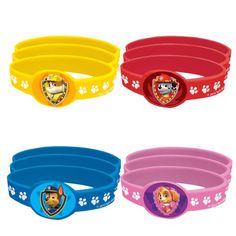 four bracelets with paw patrol designs on them