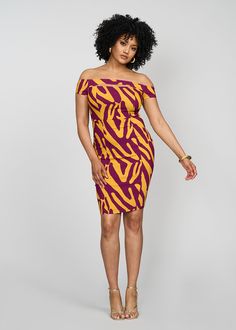 Style#: 1097/ P1097 Transform your office-to-party look with this gorgeous and eye-catching Keruba dress in the Gold Zebra Abstract print. It is the perfect, flirty, off-the-shoulder, dress for date nights, dinner parties, and birthday fits. Description Burgundy and Gold Stretch woven fabric Princess seams down front & back bodice and skirt Off-shoulder neckline Invisible zipper with hook and eye at center back Cut out at bodice Knee length 72% Rayon/ 24% Nylon/ 4% Spandex Designed in the USA, i Printed Knee-length Midi Dress For Party, Fitted Printed Midi Dress For Night Out, Party Knee-length Printed Mini Dress, Flirty Printed Mini Dress For Party, Flirty Printed Party Dresses, Chic Fitted Dress With Bold Print, Bold Fitted Party Dress, Zebra Abstract, Dress For Date