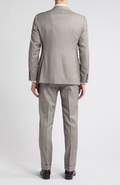 Dapper and distinctive, this pale-brown wool suit features traditional detailing and makes a smart choice for warm-weather occasions. Jacket has notched lapels; four-button cuffs; chest pocket; flap pockets; side vents Trousers have zip fly with button-tab closure; slant pockets; back button-welt pockets Jacket is lined; trousers are lined to the knee 100% virgin wool Dry clean Imported Brown Tailored Double-breasted Suit, Classic Single-breasted Wool Suit, Double-breasted Wool Suits With Concealed Placket, Semi-formal Brown Double Breasted Suit With Welt Pockets, Brown Tailored Single-breasted Suit, Men Suit, Pocket Jacket, Wool Suit, Flap Pocket