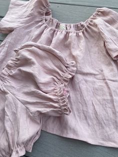 This vintage baby doll style pajama set extremely comfortable cute and made out of 100% linen, and great for spring/summer even fall nightsThe color is shown in here is dusty rose but check out our other available colors..It is made to order and it will be  totally customized for you.Please don’t hesitate to contact me if you have any questions regarding this product prior to your purchase.CARE:Washing machine – white linen at 60 degrees, colored linen at 40 degrees. Use a mild soap.  Low tumble Cotton Short Set For Bedtime In Spring, Cute Spring Loungewear Short Set, Summer Ruffled Bloomers For Daywear, Summer Matching Set Tops For Daywear, Summer Daywear Matching Set Tops, Spring Cotton Short Set For Pajama Party, Linen Sets For Pajama Party In Spring, Linen Sets For A Spring Pajama Party, Linen Sets For Spring Pajama Party