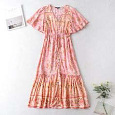 The Most Gorgeous, Vibrant Boho Chic Dress With Amazing Detail. 100% Cotton, This Dress Is A Summer Fall Capsule Piece, Elevating Your Look Instantly. 100% Cotton Material Measurements Small: Shoulder - 36cm Sleeve - 26cm Bust - 92cm Length - 109cm Medium: Shoulder - 37cm Sleeve - 27cm Bust - 96cm Length - 110cm Large: Shoulder - 38cm Sleeve - 28cm Bust - 100cm Length - 111cm Feminine Pink Maxi Dress With Ruffle Hem, Pink Maxi Dress With Ruffle Hem For Vacation, Pink Flowy Short Sleeve Midi Dress, Pink Short Sleeve Flowy Midi Dress, Flowy Pink Midi Dress With Short Sleeves, Pink Ruffle Hem Midi Dress For Summer, Pink Summer Midi Dress With Ruffle Hem, Casual Pink Maxi Dress With Ruffle Hem, Flowy Pink Midi Dress With Ruffle Hem