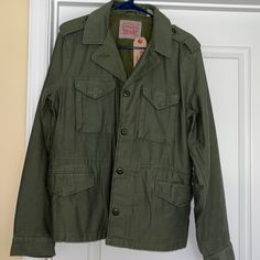 Brand New Cargo Jacket Size: X-Large 100 Percent Cotton Green Cotton Sport Coat With Pockets, Casual Long-sleeved Sport Coat With Side Pockets, Green Cotton Outerwear With Side Pockets, Green Military Outerwear With Patch Pockets, Green Utility Outerwear With Pockets, Green Cotton Outerwear With Cargo Pockets, Casual Long Sleeve Sport Coat With Flap Pockets, Casual Sport Coat With Patch Pockets And Long Sleeves, Casual Long Sleeve Sport Coat With Patch Pockets