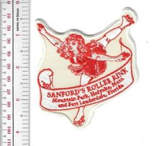 a red and white patch with a woman holding a tennis racquet on it