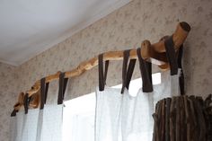 the curtain rod is made out of wood