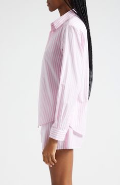 Perky pink stripes rev up your day in a cotton shirt cut in a relaxed profile aligned with new ways of working. 29 1/2" length (size Large) Front button closure Spread collar Curved hem Long sleeves with button cuffs 100% cotton Dry clean or machine wash, line dry Made in Portugal Asian & Pacific Islander Owned/Founded Classic Pink Top With Striped Collar, Classic Pink Relaxed Fit Blouse, Classic Pink Blouse With Relaxed Fit, Cotton Shirt With Vertical Stripes For Daywear, Pink Cotton Shirt With Striped Collar, Pink Collared Shirt For Daywear, Pink Vertical Stripes Button-up Top, Pink Vertical Striped Button-up Top, Pink Relaxed Fit Tops With Vertical Stripes