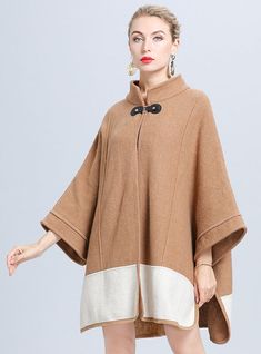 Pattern: solid colorVersion: cloak typeLength: medium length (65cm＜ < length ≤80cm)Collar type: round neckSleeve length: long sleevesColor: camelSize: average size Winter Long Sleeve Solid Color Cape, Elegant Beige Poncho For Fall, Oversized Beige Cape Outerwear, Winter Solid Outerwear With Batwing Sleeves, One Size Brown Sweater Coat For Winter, One-size Brown Sweater Coat For Winter, Brown Long Sleeve Outerwear One Size, Brown Long Sleeve Outerwear, One Size, Brown One-size Sweater Coat For Winter