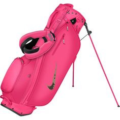 a pink golf bag with two clubs attached to the back and one on the side