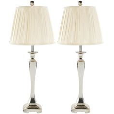 pair of chrome plated table lamps with pleated shades on each lamp, one light turned off and the other turned off