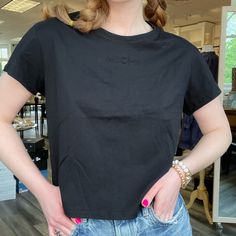 Relaxed, Boxy Tee With An Embossed Michi Logo. Layer Over A Sports Bra Or Pair With High Waisted Denim. Boxy Black Cotton Top, Casual Boxy Black Top, Black Boxy Top For Spring, Casual Boxy Cotton Tops, Casual Boxy Tops For Everyday Wear, Casual Boxy Top For Everyday, Casual Boxy Tops, Chic Boxy Fit Crew Neck Top, Trendy Black Boxy Fit Top