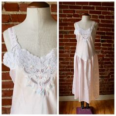 "Stunning slinky pink & lace slip dress with a drop-waist. Great condition- some normal vintage wear. Light discolorations on lace & pilling on skirt. Labeled size S- fits like a M. Please see measurements for accurate fit. Measurements: Length: 42\" Waist: 33\" Chest: 36\" Please message me with any questions about this item. Thank you for visiting BugB! v i n t a g e a c c e s s o r i e s https://www.etsy.com/shop/BugBVintage?section_id=26868050 v i s i t t h e s h o p www.BugBVintage. Vintage Summer Slip Dress With Delicate Lace, Sleeveless Vintage Lace Slip Dress, Spring Vintage Pink Dress With Lace Trim, Vintage Lace Trim Slip Dress, Vintage Pink Slip Dress With Lace Trim, Vintage Slip Dress, Vintage Slips, Lace Slip Dress, Lace Slip