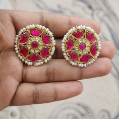 Pink flower kundan studs with pearls Material : 925 Hallmarked Silver Stones : Semi-precious pink and white kundans, fresh water pearls Fusion Style Kundan Pearl Earrings With Meenakari, Traditional Pink Pearl Earrings For Festive Occasions, Pink Pearl Earrings For Festivals As Gift, Pink Pearl Earrings For Festivals And Gifts, Pink Pearl Earrings For Gift And Festivals, Traditional Pink Jewelry With Dori Work, Festive Pink Jewelry With Dori Work, Diwali Kundan Pearl Earrings, Round Shape, Kundan Pearl Round Earrings In Temple Jewelry Style