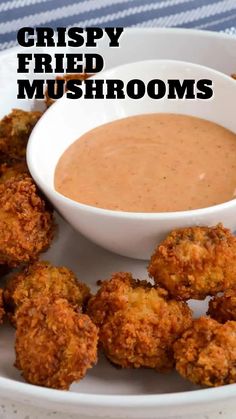 crispy fried mushrooms on a plate with dipping sauce