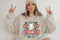 Spooky Season Sweatshirt, Halloween Sweatshirts for Women, Halloween Shirts, Halloween Sweater, Funny Halloween Ghost Sweater Unisex/ Mens  50% cotton / 50% poly blended Crewneck sweatshirt Distressed graphic. * preshrunk 50% cotton/50% polyester  * 7.75-oz.  * air-jet yarn for softer feel and no pilling  * set-in sleeves  * double-needle stitching throughout  * 1x1 athletic rib with spandex  SHIPPING: This item will be shipped within 7 business days after the payment is received.  Men's SIZING Mug Svg Free, Ghost Silhouette, Gnome Shirt, Fall Gnome, Ghost Tee, Mug Svg, Pumpkin Sweatshirts, Halloween Sweater, Sweatshirt Halloween