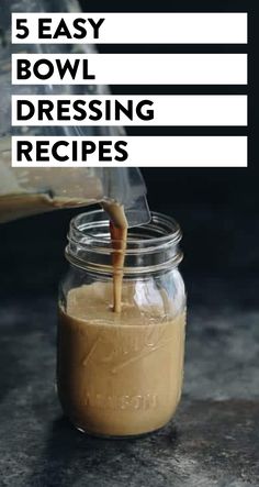 a glass jar filled with brown liquid and the words 5 easy bowl dressing recipes on it