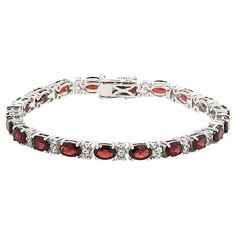 Colleen Lopez Gemstone and White Zircon Tennis Bracelet A testament to timeless elegance and refined taste, this sterling silver tennis bracelet sparkles with oval-cut gemstones and round white zircon.       S/M approx. 6-3/4"L x 1/8"W     M/L approx. 7-1/2"L x 1/8"W     Stamped .925 sterling silver; rhodium plating     Box clasp with double safety catches   Stone Information       All sizes and weights approximate     Total Carat Weight: 12ct (S/M Blue Topaz), 12.8ct (S/M Garnet), 13.2ct (M/L B Classic Oval Jewelry With Sparkling Stones, Fine Jewelry Tennis Bracelet With Gemstone Accents, Oval Gemstone Tennis Bracelet In Fine Jewelry Style, Formal Fine Jewelry Tennis Bracelet With Gemstone Accents, Elegant Tennis Bracelet With Cubic Zirconia Stones, Formal Oval Gemstone Tennis Bracelet, Elegant Tennis Bracelet With Gemstone Accents, Classic Oval Gemstone Tennis Bracelet, Oval Gemstone Accent Bracelets For Anniversary