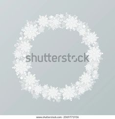 snowflakes in the shape of a circle on a gray background