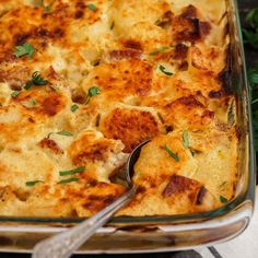 a casserole dish with meat and cheese in it, ready to be eaten