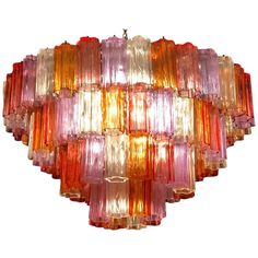 a multicolored chandelier hanging from the ceiling