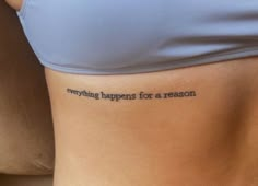 a woman's stomach with the words everything happens for a reason written on it