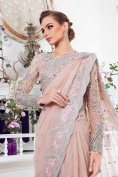 Royal Pink Embellished Pakistani Wedding Dress in Net Saree Style is a beautiful attire in Premium quality fabric. This Pakistani Dress is available Online Pink Pakistani Wedding Dress, Pakistani Saree, Royal Pink, Saree Style, Pakistani Wedding Dress, Pakistani Dress, Net Saree, Embellished Blouse, Pakistani Wedding