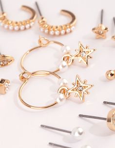 Description Mix them, match them, stack them! Our mixed stud earring pack has everything you need to create a lovely layered look. Wear these studs together for a curated ear look, or go for simple elegance and choose a pair to wear. Spring Jewelry Trends, Textured Gold Ring, Earring Pack, Curated Ear, Fashion Jewellery Online, Bold Earrings, Spring Jewelry, Textured Ring, Pearl Stud Earrings