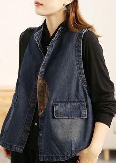 Casual Button-up Vest Outerwear, Cotton Button-up Vest With Buttons, Casual Button Closure Vest For Fall, Casual Vest With Button Closure For Fall, Casual Fall Vest With Button Closure, Blue Sleeveless Denim Vest For Fall, Spring Denim Blue Buttoned Vest, Blue Button-up Vest For Spring, Fall Button-up Denim Vest