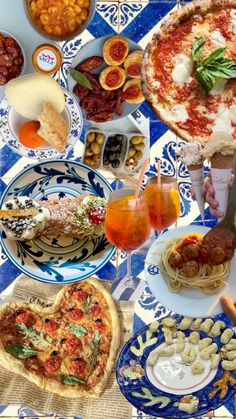 a table topped with lots of different types of food