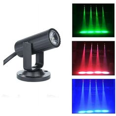 three different colored lights on top of a white background and one is red, green, blue, and purple