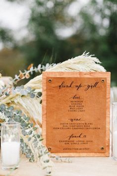 a wooden sign sitting on top of a table