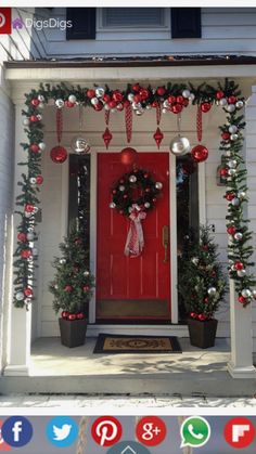 a red front door decorated with christmas decorations