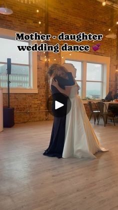 a man and woman dance together in a large room