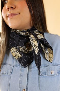 Our beautiful new line of wild rags are so fun and great for the upcoming seasons! Tie this in your hair, around your neck, or around your purse and you're set! Scarf is 100% Silk. Size: Regular Wild rag measures 34.5 x 34.5 inches. SKU: #Charmeuse-Python (1104-2008) Adjustable Black Bandana For Spring, Trendy Fall Bandana, Trendy Black Bandana For Spring, Adjustable Black Bandana For Gift, Adjustable Black Bandana Gift, Trendy Black Scarf As Gift, Black Silk Scarf For Spring Gift, Trendy Black One Size Bandana, Black One Size Bandana Scarf