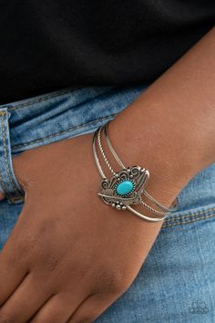 Dotted with a refreshing turquoise stone accent, a decorative silver feather frame is pressed into the center of an ornately layered cuff for a whimsical vibe.

 Sold as one individual bracelet. Feather Frame, Blue Cuff Bracelet, Jewelry To Buy, Jewelry Bracelets Silver, Turquoise Bracelet Cuff, Silver Feather, Toggle Bracelet, Turquoise Cuff, Paparazzi Accessories