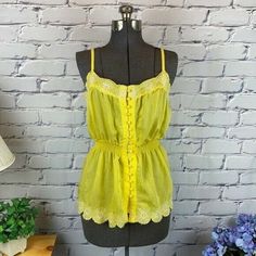 New With Tags. This Super Cute Tank Has Elastic Button Loops, Flower Embroidered Hems, & Elastic Waistband. Rayon/Nylon Blend Machine Wash, Line Dry Adjustable Shoulder Straps Scallop Hem Lightweight Size Small Check The Measurements In The Picture For A Good Fit. F2 Yellow Sleeveless Top With Lace Trim, Yellow Lace Trim Sleeveless Top, Spring Cami Tops With Lace Trim, Spring Casual Camisole With Buttons, Summer Tank Top With Buttons For Day Out, Summer Day-out Tank Top With Buttons, Summer Day Out Tank Top With Buttons, Cute Button-up Summer Tops, Cute Summer Button-up Tops