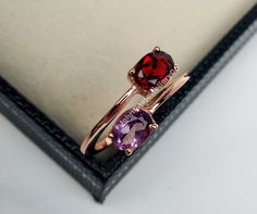 Important Note:- As we used natural gemstone so gemstone color may sometime slightly different. All type of jewelry like Pendant,Nacklace,Rings,Earrings and all type of unique item available. This Ring Features a Garnet 5x7 Amethyst 5x7 mm Oval Cut Natural Garnet And Amethyst and 925 sterling silver with Nickel Free Rhodium It is made by hand. Metal & Metal Purity:- 925 Sterling Silver with nickel Free Rhodium Gemstone:- Natural Garnet And Amethyst Made In:- Jaipur Rajasthan (Amethyst is a natur Luxury Timeless Amethyst Ring For Gift, Amethyst Stone Ring, Garnet And Amethyst Ring, Purple Amethyst Ring, Promise Ring Gift, Jaipur Rajasthan, Ring Promise, Anniversary Bands, Multi Stone Ring