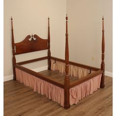 the bed is made up and ready for someone to put it in their room or on the floor