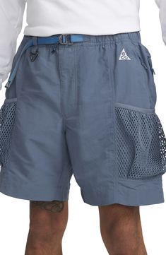 Large side mesh pockets distinguish the cargo inspiration behind these durable, midweight nylon shorts with a water-repellent finish. A roomy fit and adjustable belt keep you comfortable on the trail and off. 7 1/2" inseam; 26 1/2" leg opening; 13" front rise; 16" back rise (size Medium) Water-repellent 100% nylon Machine wash, tumble dry Imported Nordstrom x Nike: A curated lifestyle destination where fashion is the ultimate sport Nike Nylon Athletic Shorts, Nylon Bottoms With Pockets For Outdoor, Summer Cargo Pants With Functional Pockets For Outdoor Activities, Nike Moisture-wicking Nylon Shorts, Nike Nylon Athletic Shorts With Built-in Shorts, Nike Nylon Shorts, Nike Casual Nylon Shorts, Casual Nike Nylon Shorts, Nylon Shorts With Mesh Pockets