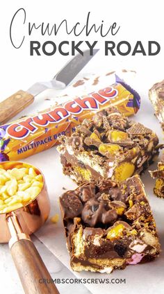 several pieces of dessert sitting on top of a paper towel next to a cookie bar