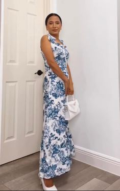 Lovely Vintage Blue Floral Maxi Dress is the perfect spring and summertime wardrobe addition! Features sweetheart neckline with tie straps, and cute ruffle detail on the neckline A banded waist ends with a tiered maxi hem & back smocking for a comfy fit Made from polyester blend fabric Comes in sizes S-L Model is wearing size S Blue And White Floral Maxi Dress, White Floral Maxi Dress, Blue Floral Maxi Dress, Comfy Fits, Floral Maxi, Floral Maxi Dress, Sweetheart Neckline, Blue Floral, Smocking