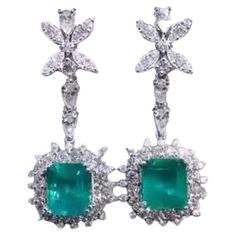 A pair of Emeralds and Diamonds , an exquisite display of elegance. This stunning combination creates a captivating piece that enhances any ensemble with its luxurious and sophisticated allure. Adds a touch of elegance and class on your look. Magnificent earring come in 18k gold with two pieces of Natural Zambian Emeralds, fine quality, vibrant color, in perfect cut, of 9,00 carats, and 98 pieces of Natural Diamonds, of 4,00 carats, F color VS clarity, very sparkly. Handcrafted by artisan goldsmith. Extremely high product. Shop with Confidence. We offer worldwide shipping , taxes free on my shipment. 18k Gold Earrings, Zambian Emerald, Dream Jewelry, Zambia, Chandelier Earrings, Two Pieces, Gemstone Jewelry, Natural Diamonds, Gold Earrings