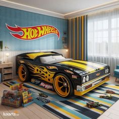 a bedroom with a hot wheels car bed in it