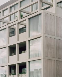 a tall building with lots of windows on top of it